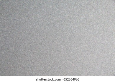 Silver Car Hood Paint Granules Up Close