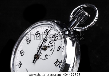 Silver chronometer object isolated on black background
