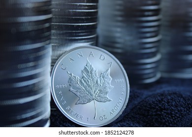 Silver coin with maple leaf
