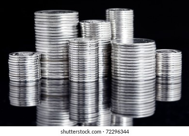 Silver Coin Stack On Black