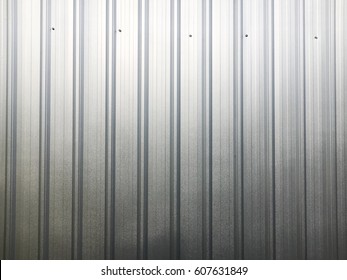 Silver color, metal sheet wall.