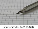 silver colored mechanical pencil pen on a white checkered sheet of paper

￼

Auf Google nach diesen Inhalten suchen


