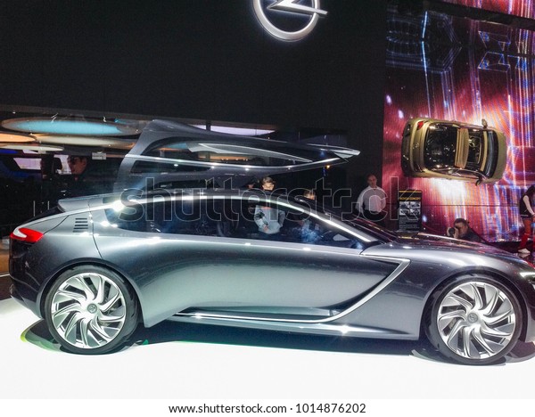 Silver coupe\
from Opel.\
Moscow, Russia - 30 August, 2014.\
New ideas of the\
auto industry at the Moscow Motor\
Show.