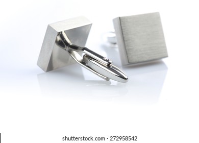 Silver Cuff Links On White Background