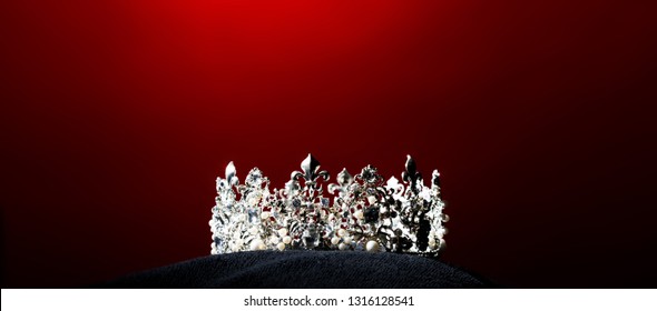 Silver Diamond Crown Of Miss Pageant Beauty Universe World Contest Sparkle Light On Black Pillow, Ready For Wear Most Beautiful Winner, Studio Lighting Super Red Gradient Background Dramatic