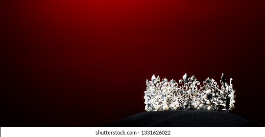 Silver Diamond Crown Of Miss Pageant Beauty Universe World Contest Sparkle Light On Black Pillow, Ready For Wear Most Beautiful Winner, Studio Lighting Super Red Gradient Background Dramatic