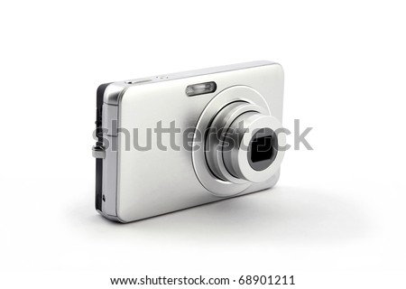 silver digital compact photo camera isolated on white background