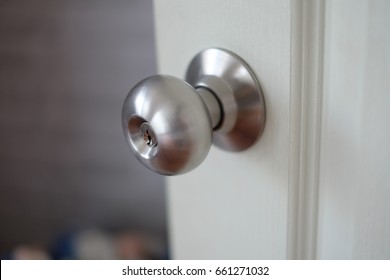 silver round door handles