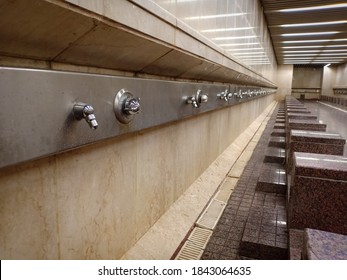 Silver Faucet In Ablution Or Wudhu Room At Mosque