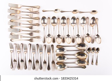 Silver Flatware On A White Background