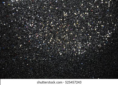 Silver glitter black background Abstract Bokeh Christmas.