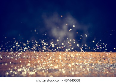 Silver Glitter Lights Background. Vintage Sparkle Bokeh With Selective Focus. Defocused. On Wood Texture. Vintage Filter Applied. - Shutterstock ID 484640308