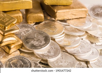 Silver And Gold Bullion On The Table