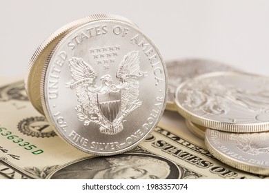 silver and gold bullion on the table - Shutterstock ID 1983357074