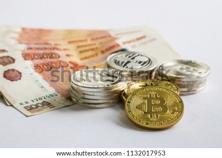 Silver Gold Crypto Coins litecoin LTC, bitcoin BTC, ripple XRP, dash . Russian ruble. Metal coins are laid out in a flat background, close-up view from the top, crypto currency exchange of money.