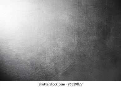 Silver gray grunge texture. Dramatic light background