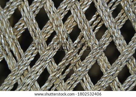 Silver lining in a criss cross pattern 