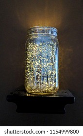 Silver Mason Jar In The Dark With Fairy Lights