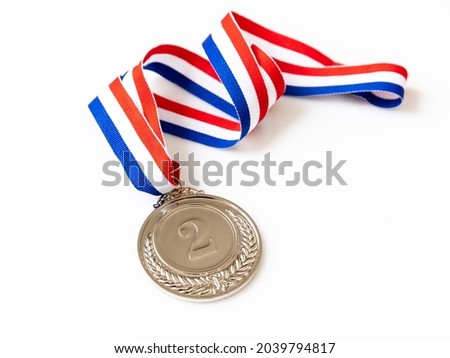Silver medal. Second place winner award and ribbon. Athlete prize in sport isolated on white background. Number two and laurel wreath
