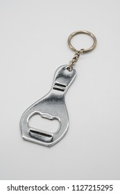 Silver Metal Bottle Opener With Key Chain Ring Isolated On White Background