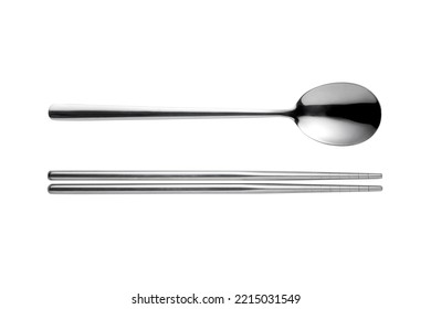 Silver metal chopsticks and spoon isolated on white background