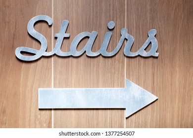 Silver Metal Letters, Pointer Of Stairs Sign On The Wall Hotel, Lobby. Concept Sign, Cursor, Inscription At The Five Star Hotel, Broken Lift, Elevator