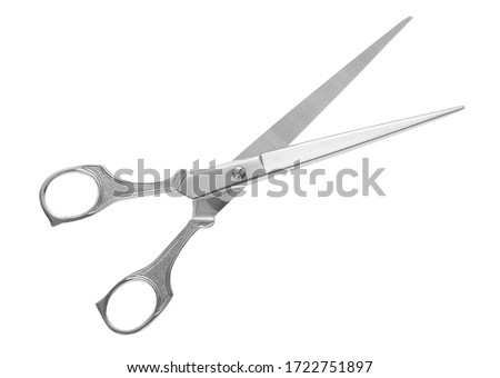 Silver metal scissors on a white background