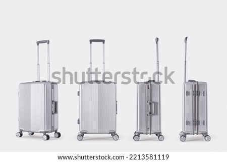 
Silver metal suitcase isolated on white background, vacation luggage in perspective view
