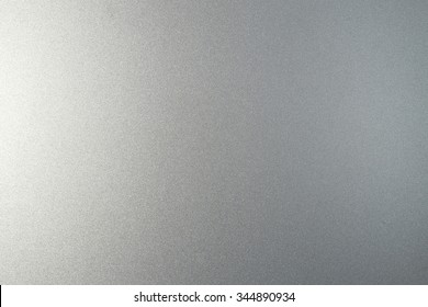 Silver metallic paint on steel texture background 
