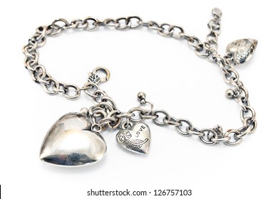 Silver Necklace  With Heart Pendants Isolated On White