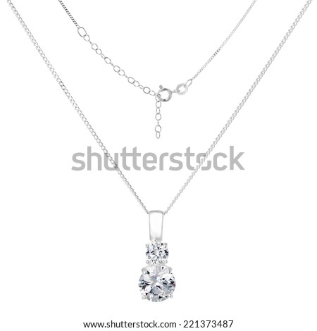 Silver necklace and pendant on white background