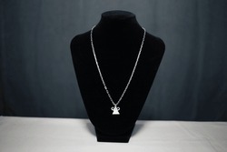 Silver Necklace With Phiaj Or Soul Lock Pendant On Black Mannequin