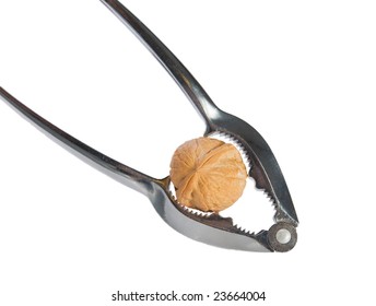 Silver nutcracker and walnut  on the white background