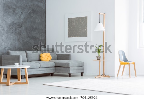 Silver Painting Above Grey Couch Set Stock Photo Edit Now