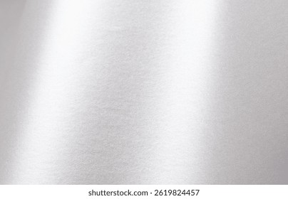 Silver paper texture with pearlescent gloss, shimmering surface and metallic platinum tones, sleek wavy effect with a modern, minimalistic design, luxurious bright finish and elegant contrast for a