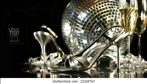 Silver party shoes with champagne glasses against a party background