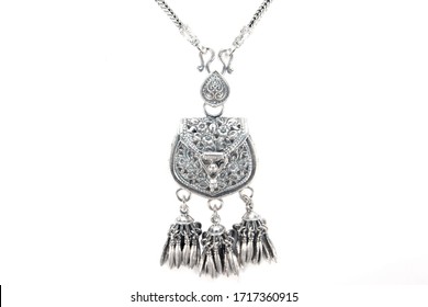Silver pendant necklace bag design pattern isolated on white background. Silver necklace decoration with pouch carving flowers pattern and bead chain