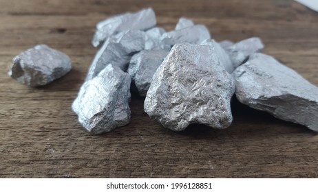 Silver Or Platinum Ore Found In The Mines On A Wooden Floor