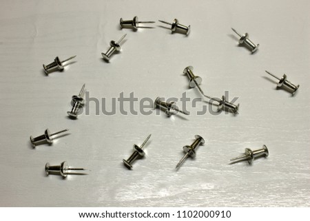 silver push pins isolated on textured stock photo edit now silver push pins