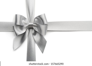 Silver ribbon bow isolated on white background