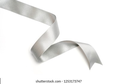 Silver Ribbon In Roll On White Background