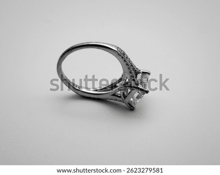 Silver ring with a stone. Close-up on white background.