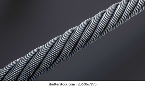 silver rope. Close-up of diagonal thick metal rope on black background. Selective focus.  - Powered by Shutterstock