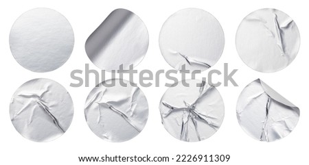 silver round adhesive stickers isolated on white background