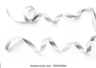 Silver satin ribbon in metallic silver grey pearl color isolated on white background 
