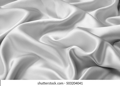 Silver Satin Or Silk Fabric As Background