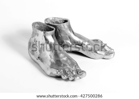 silver sculpture vase of human foot form