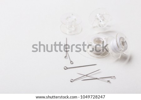 Silver Sewing Pins Plastic Bobbin White Stock Photo Edit Now Delectable Bobbin Pin Sewing Machine Silver Sewing Pins Plastic Bobbin White Stock Photo Edit Now Delectable Bobbin Pin Sewing Machine