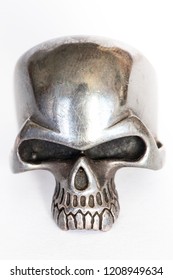 Silver skull ring in white background 