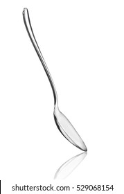 Silver spoon isolated on white background - Shutterstock ID 529068154